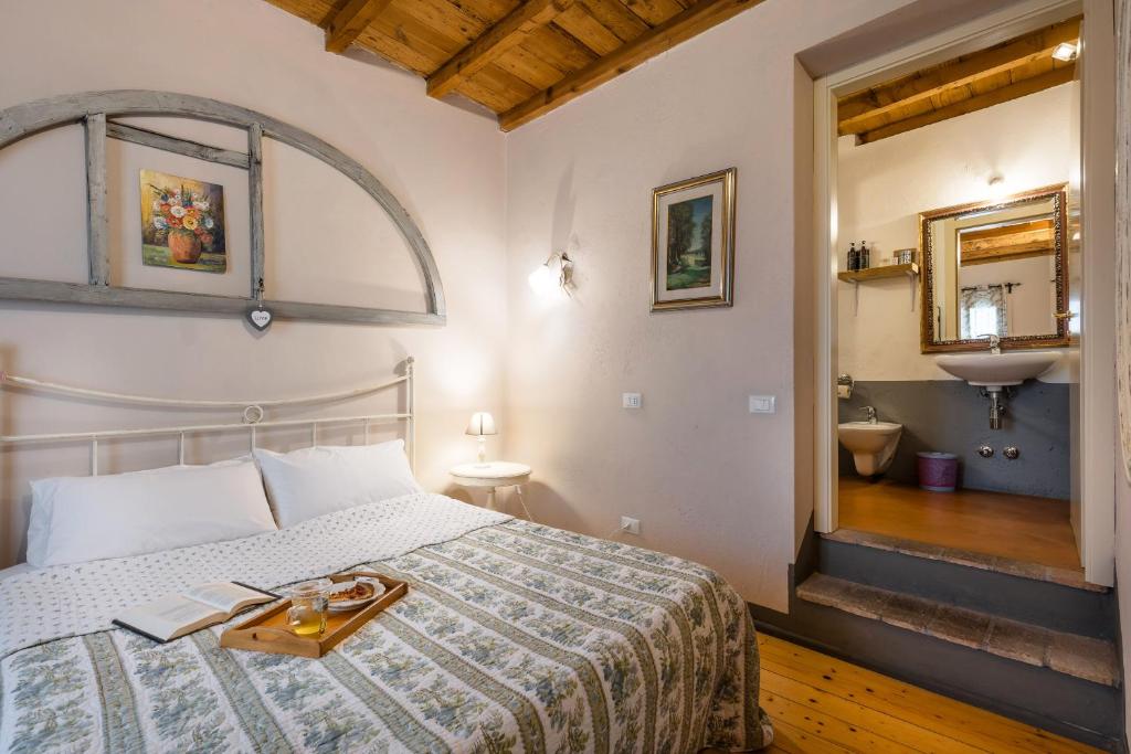 Postel nebo postele na pokoji v ubytování B&B Corte del Mincio