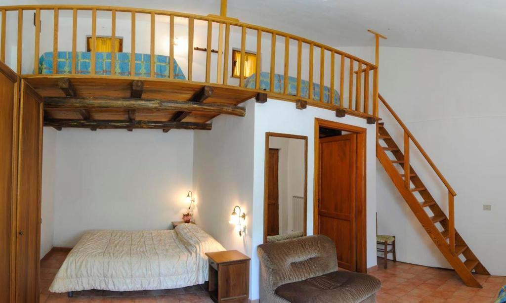Postel nebo postele na pokoji v ubytování Agriturismo La Ferrera