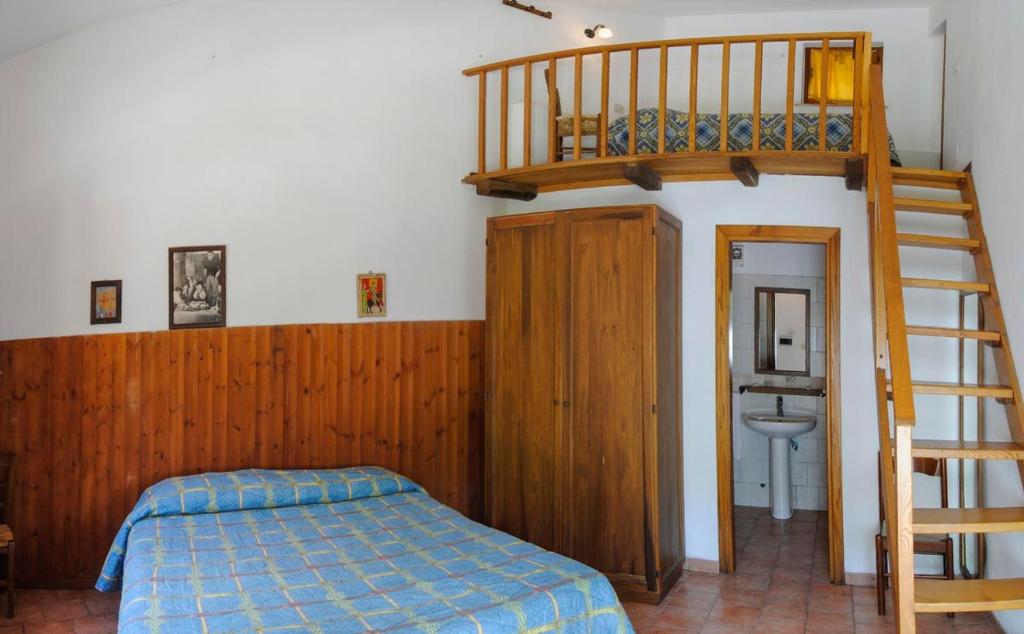 Postel nebo postele na pokoji v ubytování Agriturismo La Ferrera