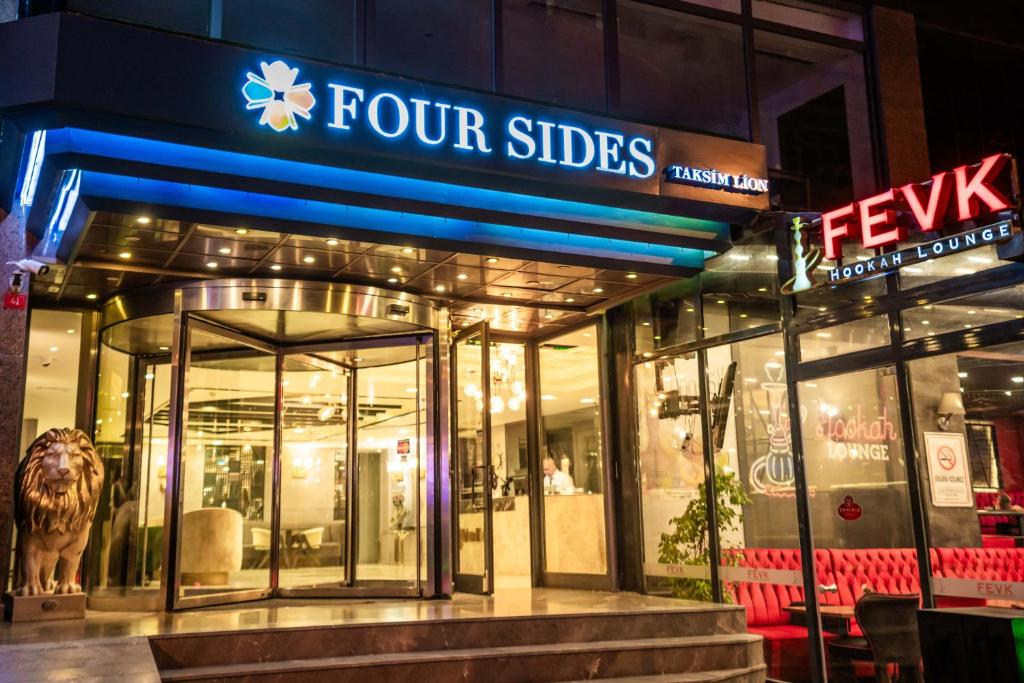 a four sides store with a dog in front of it at Four Sides Taksim Lion Hotel&Spa in Istanbul