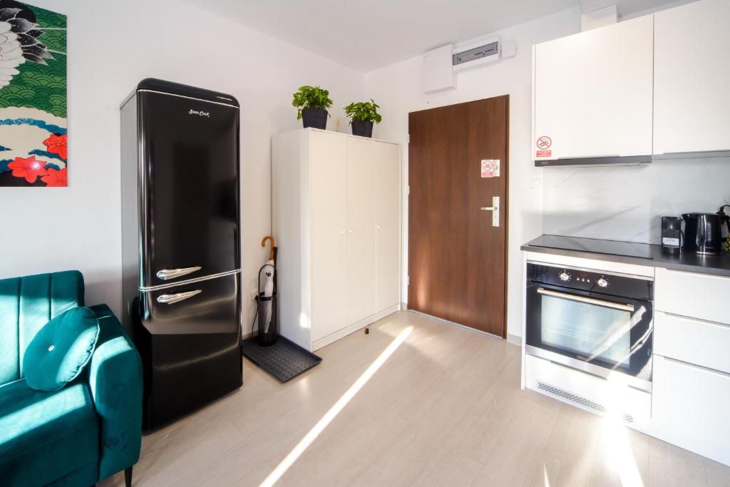 Maya's Apartmentsにあるキッチンまたは簡易キッチン