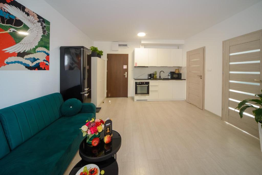 Maya's Apartmentsにあるキッチンまたは簡易キッチン