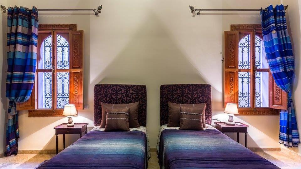 Postel nebo postele na pokoji v ubytování Riad Des Nations