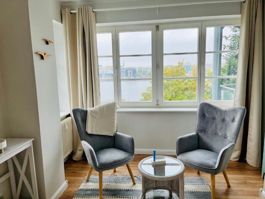 Posezení v ubytování Traumwohnung mit Stadthafen-Panorama! Zwei Schlafzimmer, Parkplatz