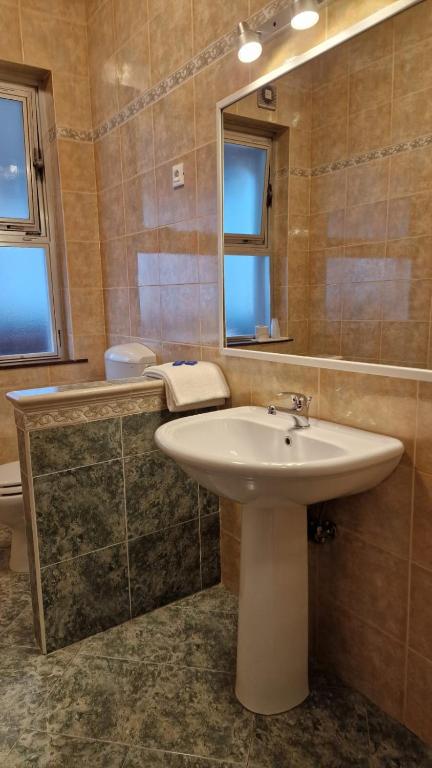 Koupelna v ubytování Hotel Milano