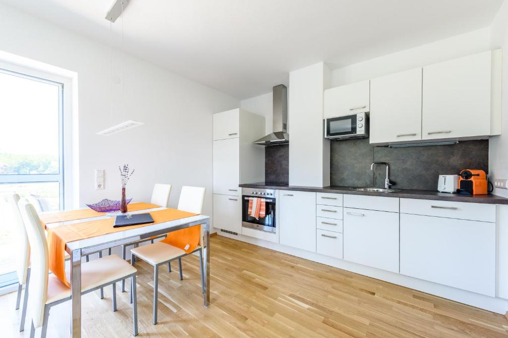 Kuchyň nebo kuchyňský kout v ubytování Apartments Jesse