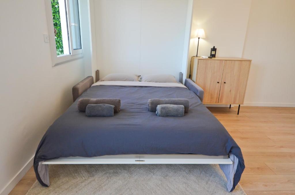 Posteľ alebo postele v izbe v ubytovaní Le Flore - Appartement neuf - Cannes Center