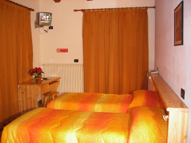 Postel nebo postele na pokoji v ubytování Hotel Savoia Debili