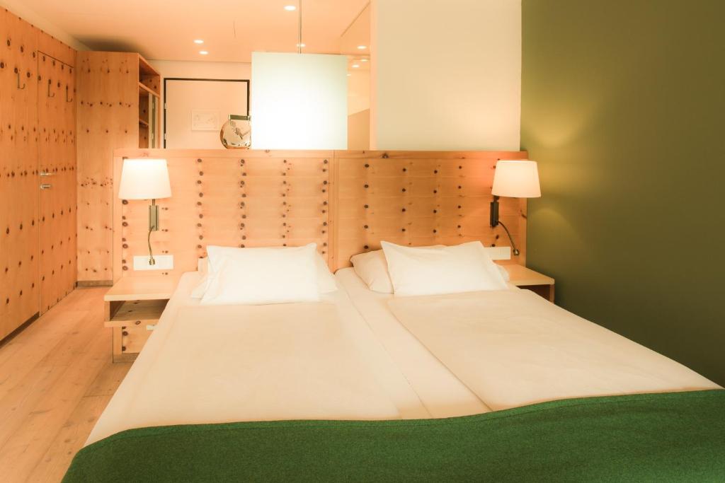 Postel nebo postele na pokoji v ubytování SPA Hotel Erzherzog Johann