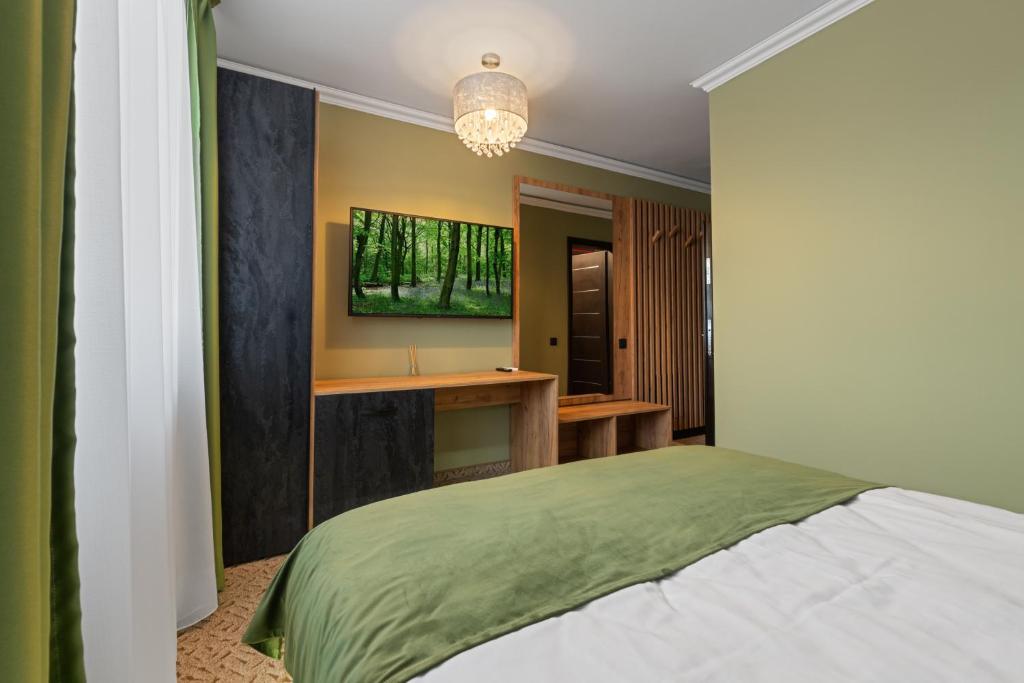 Postel nebo postele na pokoji v ubytování Fit Residence