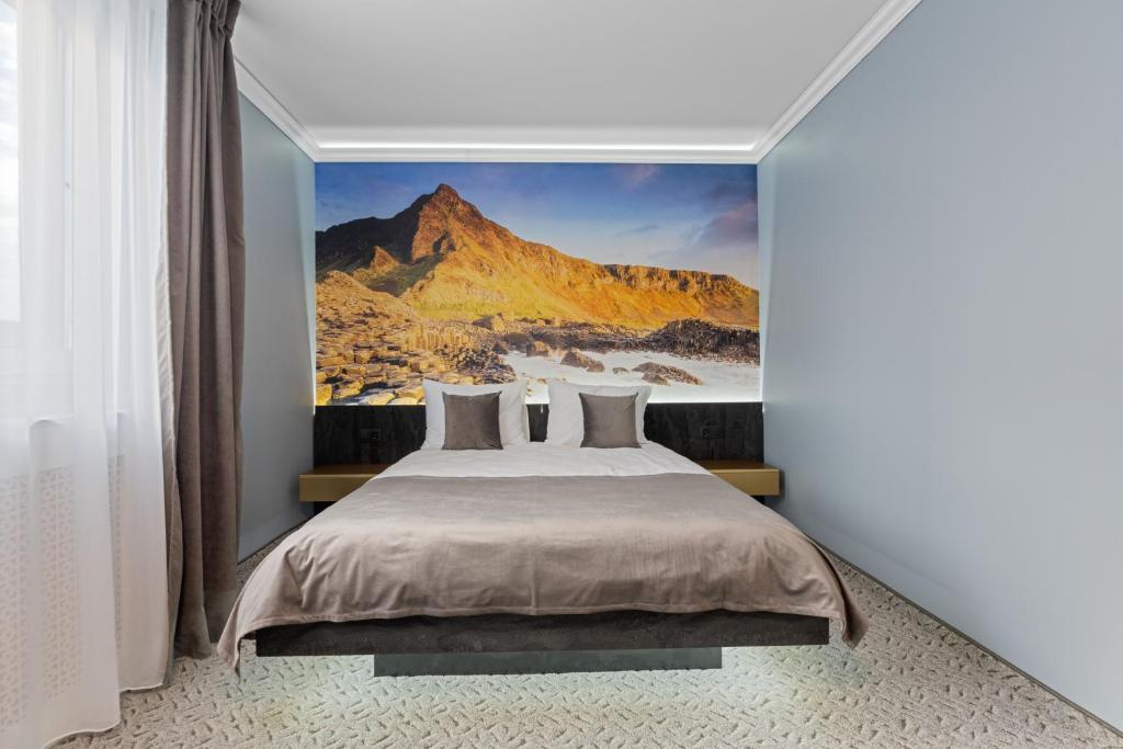 Postel nebo postele na pokoji v ubytování Fit Residence