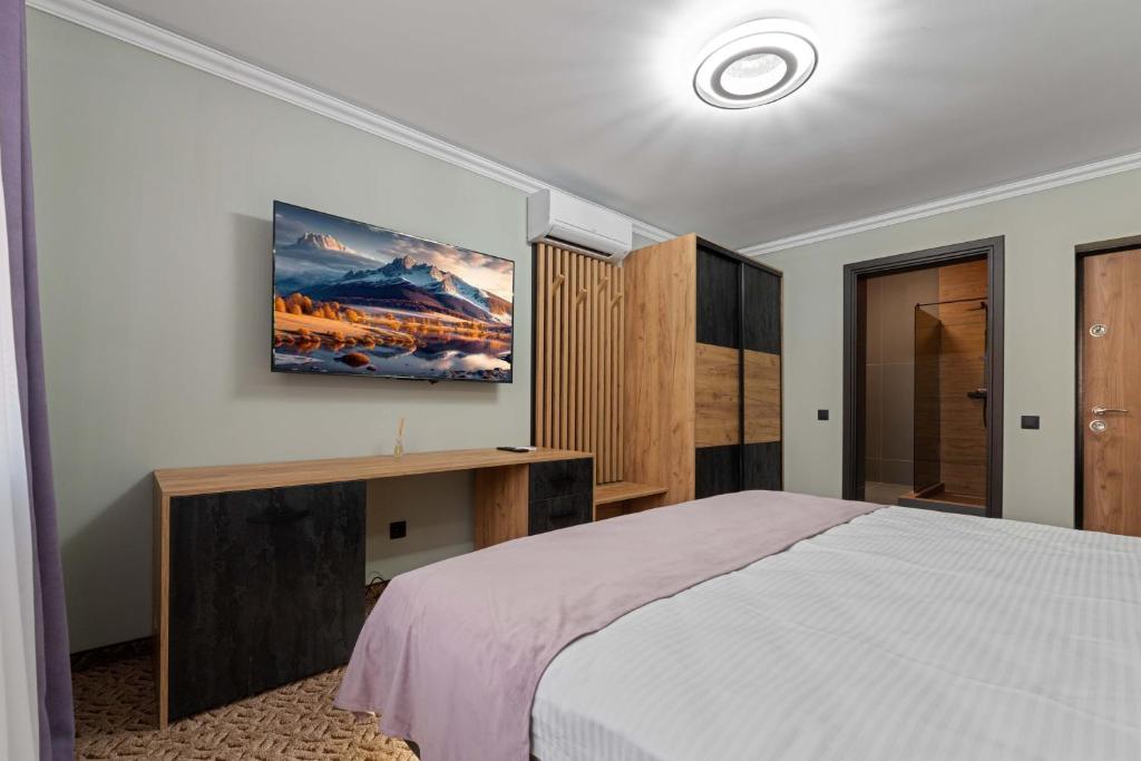 Postel nebo postele na pokoji v ubytování Fit Residence
