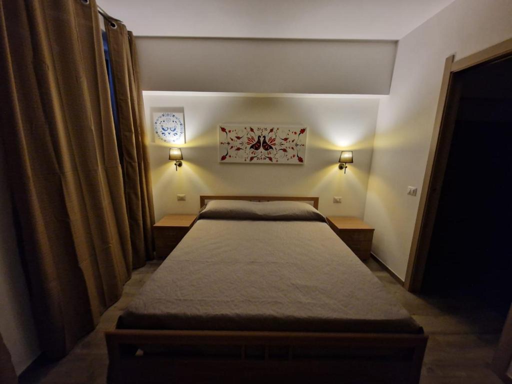 Postel nebo postele na pokoji v ubytování CASA MADE'