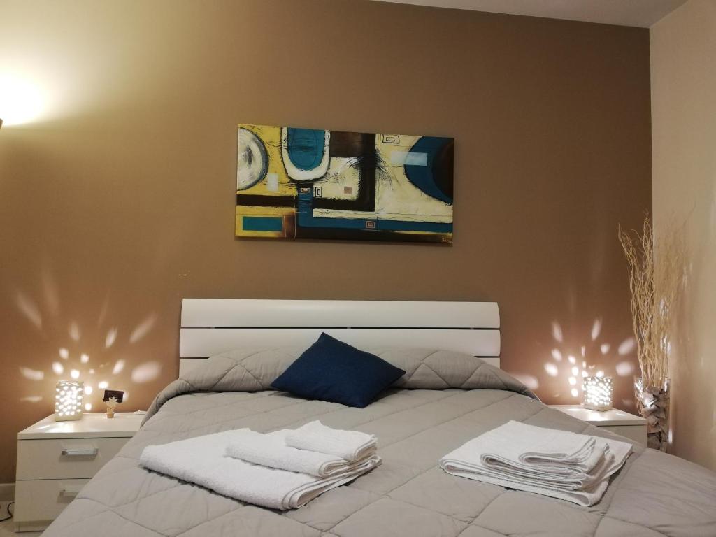 Posteľ alebo postele v izbe v ubytovaní B&B Li Figuli