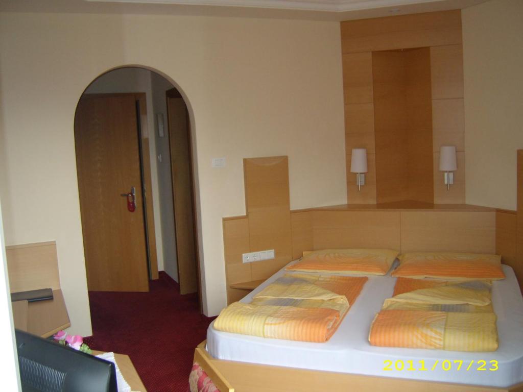 Postel nebo postele na pokoji v ubytování Hotel Elisabeth
