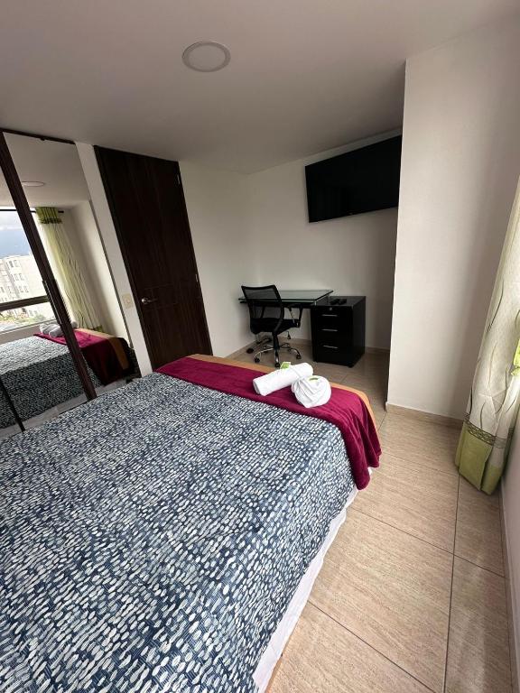 Postel nebo postele na pokoji v ubytování HOSPEDAJE SARY HOUSE