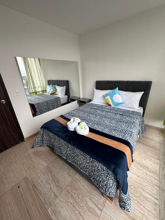 Postel nebo postele na pokoji v ubytování HOSPEDAJE SARY HOUSE