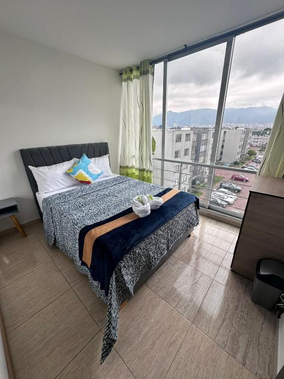 Postel nebo postele na pokoji v ubytování HOSPEDAJE SARY HOUSE