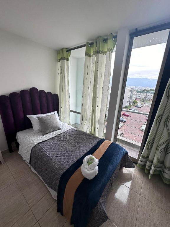 Postel nebo postele na pokoji v ubytování HOSPEDAJE SARY HOUSE