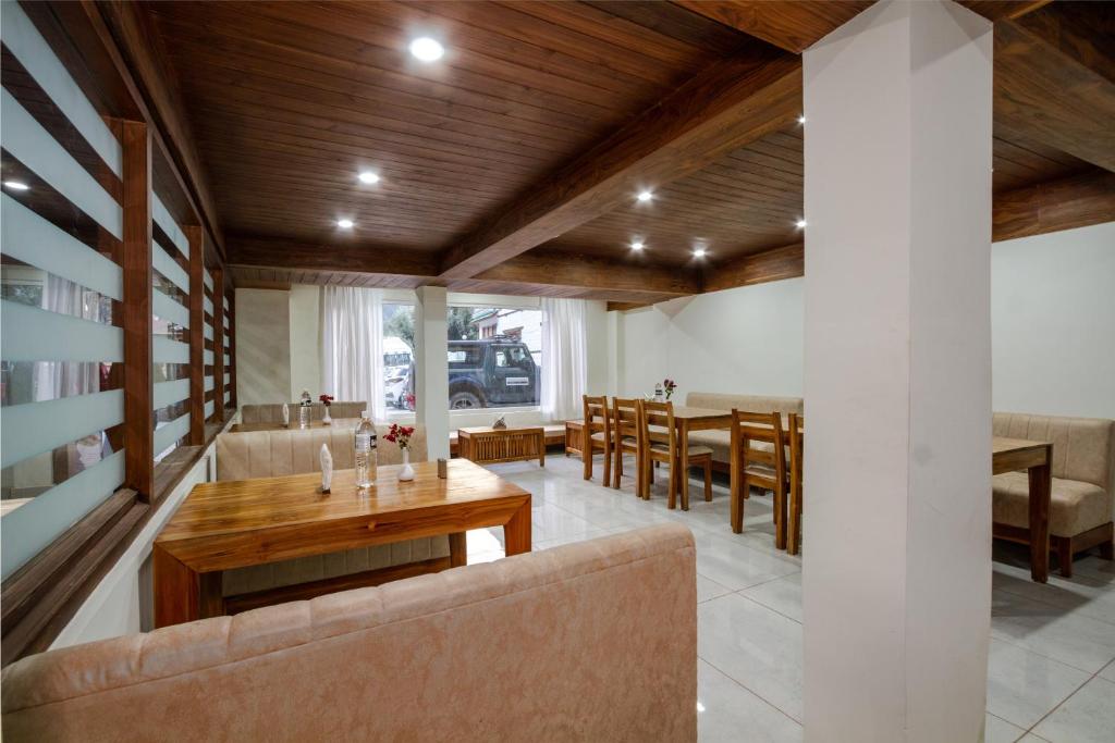 Posezení v ubytování Tripli Hotels Drilbu Manali