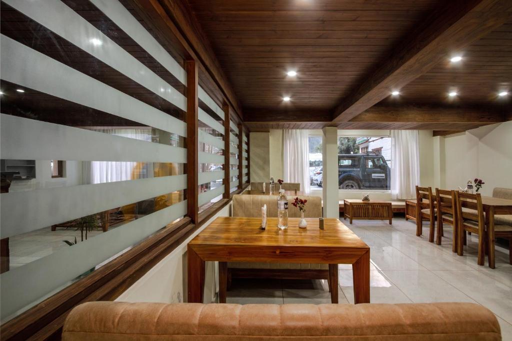 Posezení v ubytování Tripli Hotels Drilbu Manali