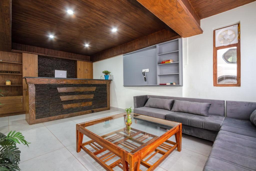 Posezení v ubytování Tripli Hotels Drilbu Manali