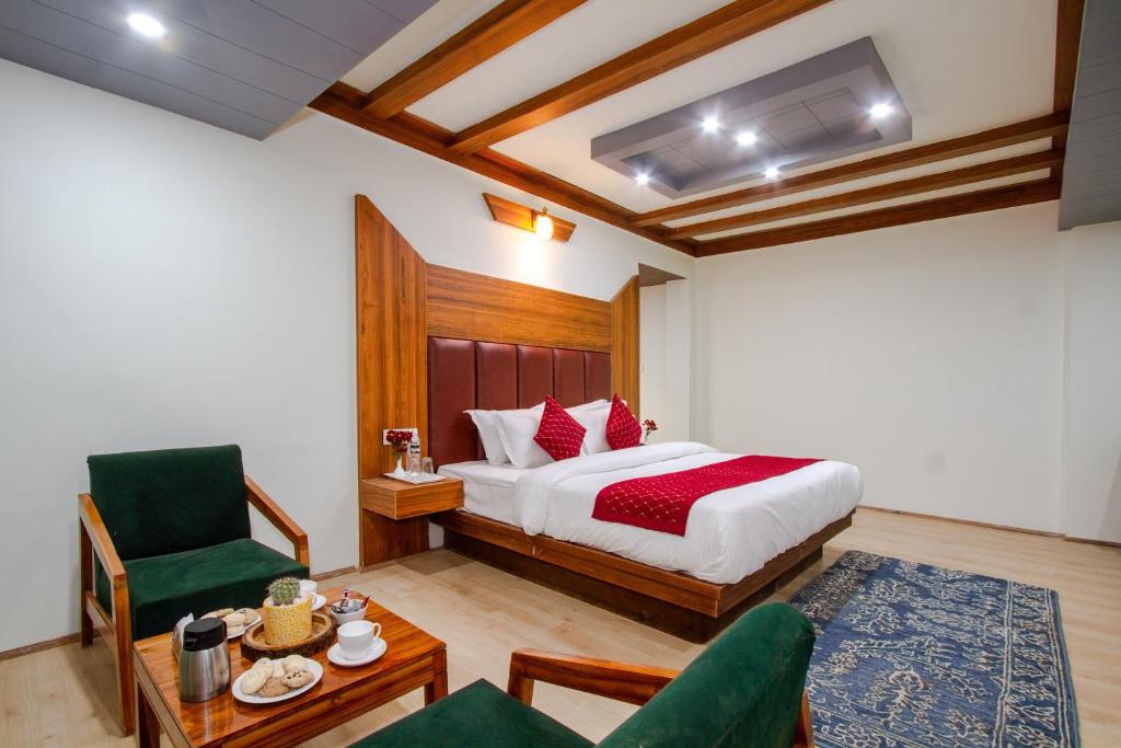 Postel nebo postele na pokoji v ubytování Tripli Hotels Drilbu Manali