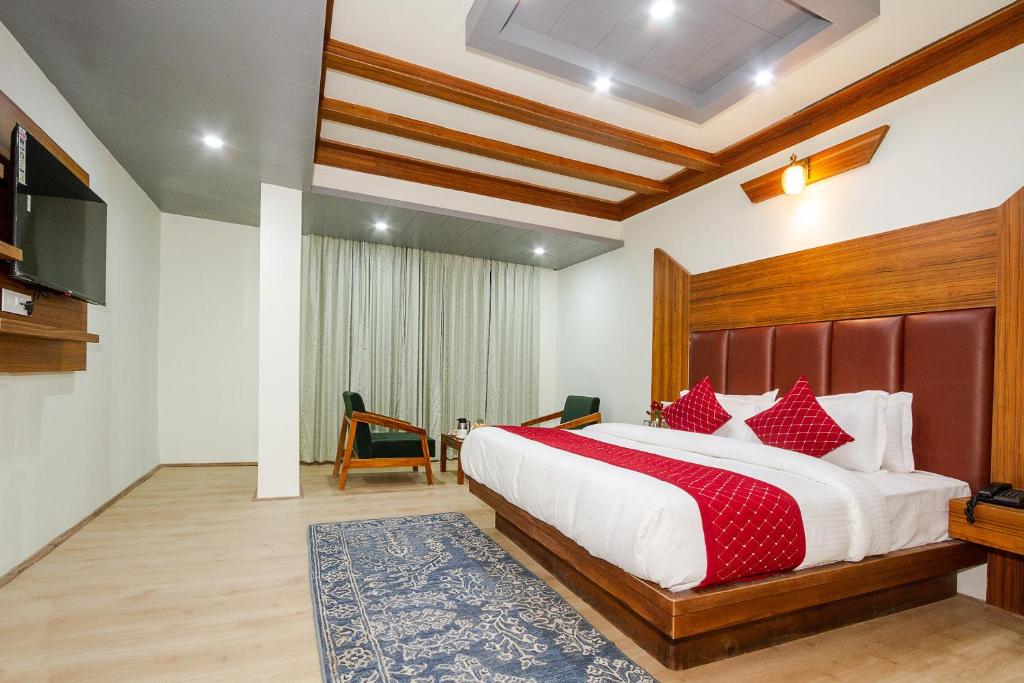 Postel nebo postele na pokoji v ubytování Tripli Hotels Drilbu Manali