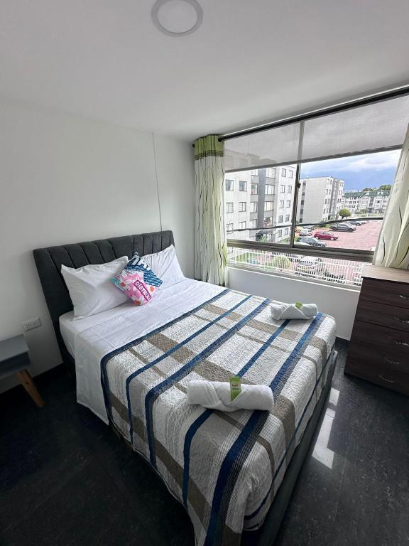 Postel nebo postele na pokoji v ubytování HOSPEDAJE SARY HOUSE