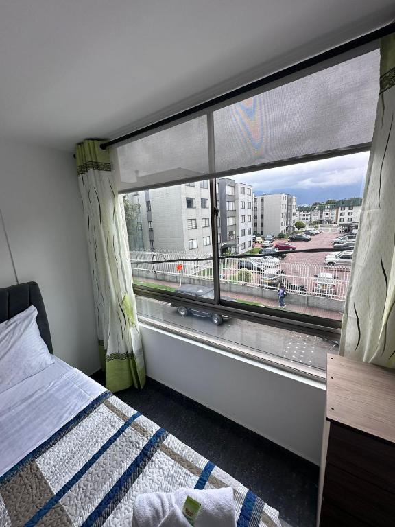 Postel nebo postele na pokoji v ubytování HOSPEDAJE SARY HOUSE