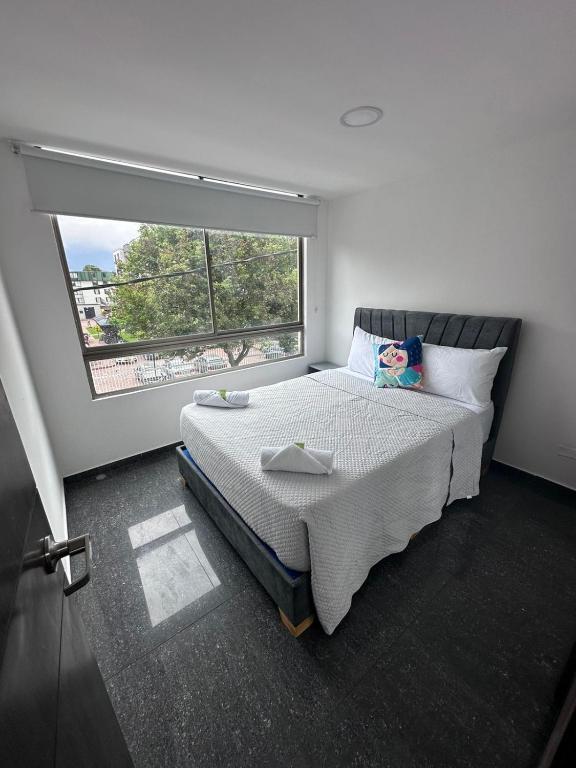 Postel nebo postele na pokoji v ubytování HOSPEDAJE SARY HOUSE