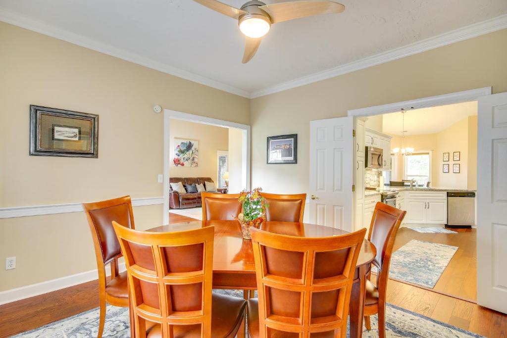 a dining room with a table and chairs at McCormick Home Monticello Golf Club Getaway! in McCormick