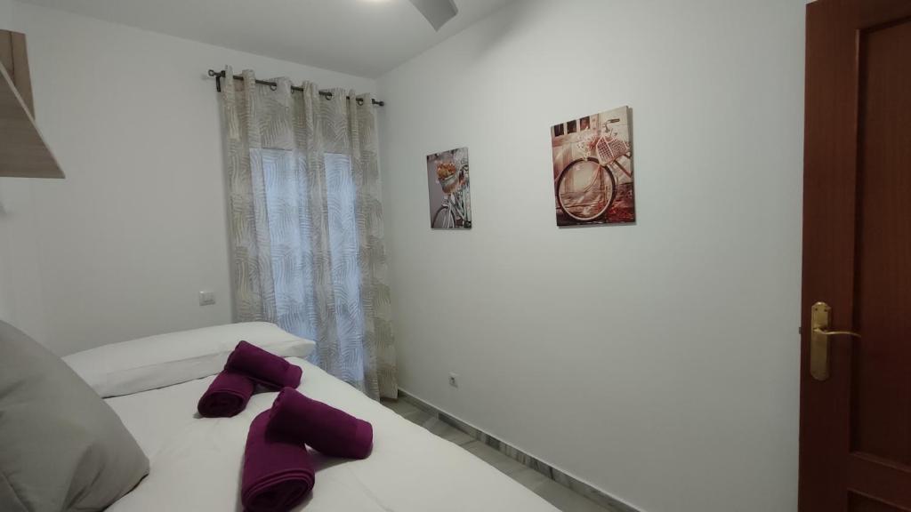Posteľ alebo postele v izbe v ubytovaní Apartamentos Séneca junto al Centro
