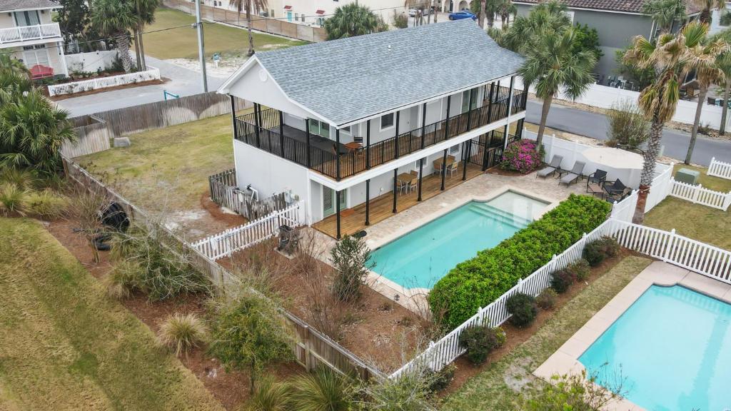 an aerial view of a house with a swimming pool at Serenity Cottage - Spacious Haven - Private Pool in Destin