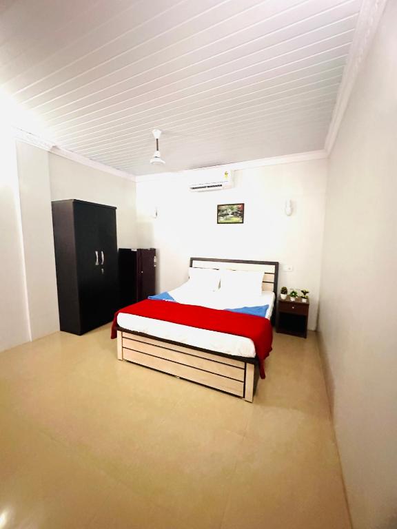 Postel nebo postele na pokoji v ubytování Blue Mirage Palolem Goa