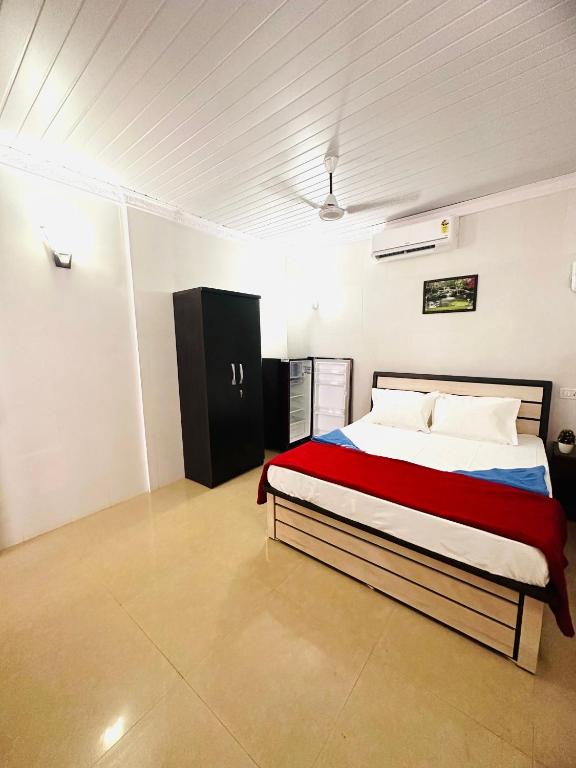 Postel nebo postele na pokoji v ubytování Blue Mirage Palolem Goa