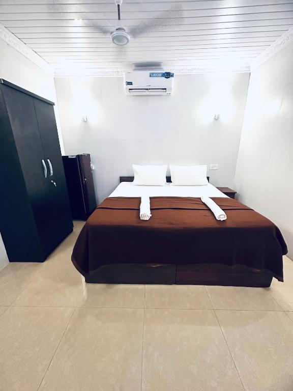 Postel nebo postele na pokoji v ubytování Blue Mirage Palolem Goa