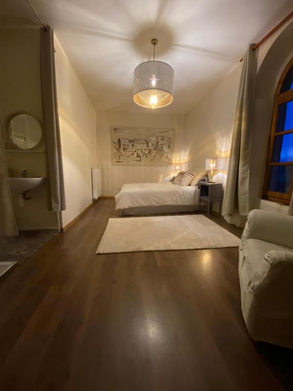 Postel nebo postele na pokoji v ubytování Auberge de Corsas