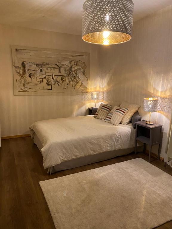 Postel nebo postele na pokoji v ubytování Auberge de Corsas