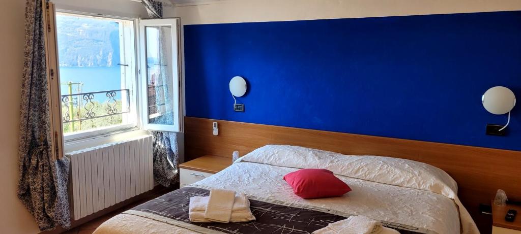 Postel nebo postele na pokoji v ubytování Hotel Bellavista Meublè