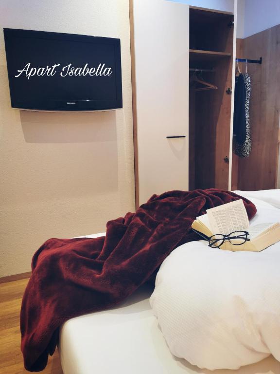 Postel nebo postele na pokoji v ubytování Apart Isabella
