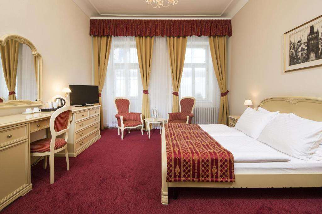 Postel nebo postele na pokoji v ubytování OREA Spa Hotel Palace Zvon Mariánské Lázně