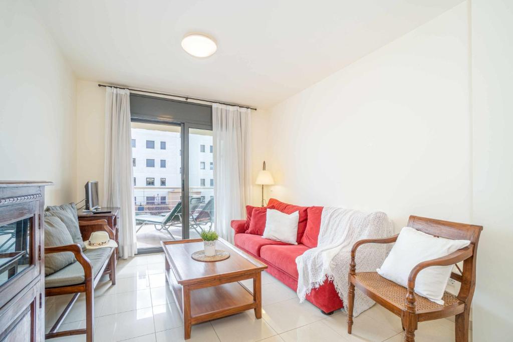 A television and/or entertainment centre at Jouvacations apartamento Joanot
