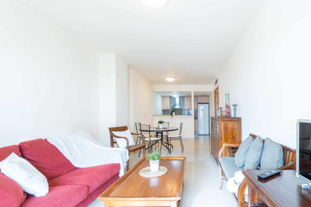 A seating area at Jouvacations apartamento Joanot