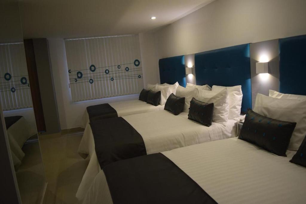 Hotel Dibeni Pereira - Deluxe Family Room