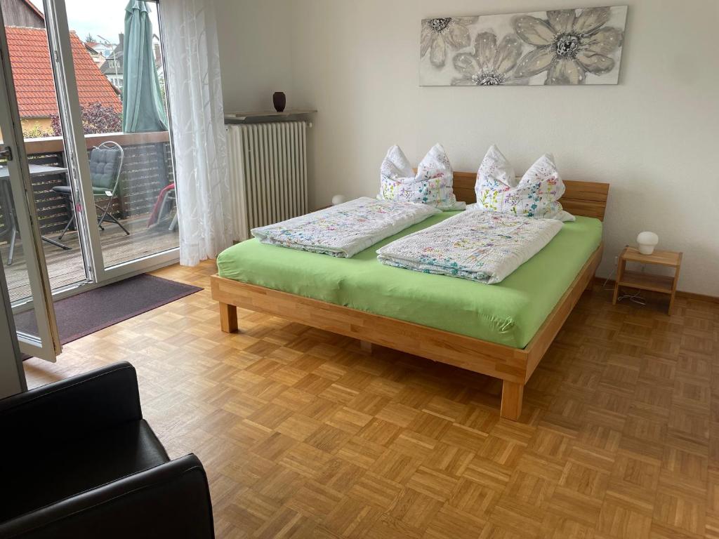 Postel nebo postele na pokoji v ubytování Ferienwohnungen Scheuring 1.OG