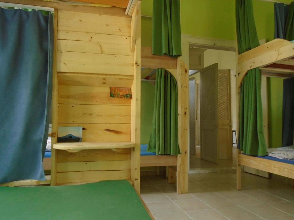 Postel nebo postele na pokoji v ubytování Lotus Garden Hostel Izmir