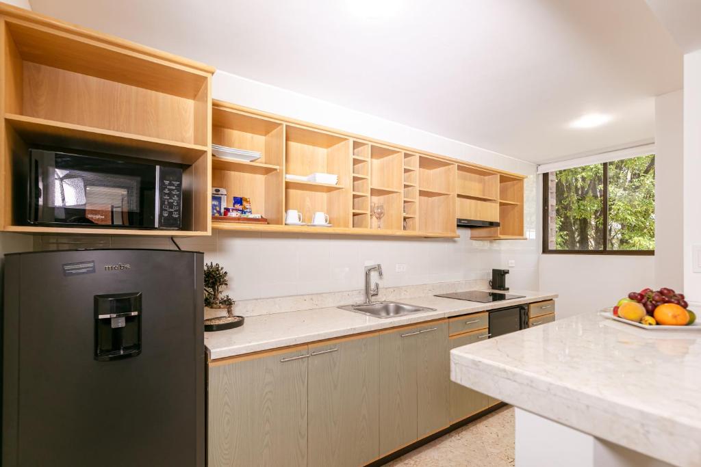 Kuchyň nebo kuchyňský kout v ubytování Hotel 101 Park House