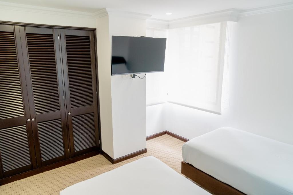 TV a/nebo společenská místnost v ubytování Hotel 101 Park House