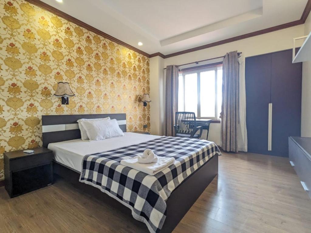 Кровать или кровати в номере Tranquil Retreat in Kathmandu